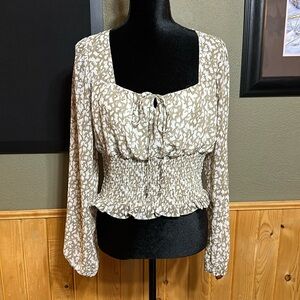 Nine Britton cheetah blouse